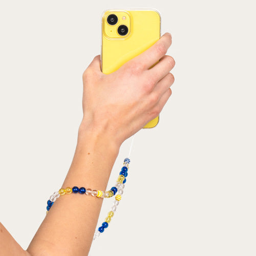 Bijoux – Collection BUBBLEGUM : accessoires colorés en perles acryliques et acier doré, disponibles en version courte.