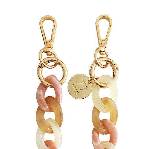 Les Chaînes d’Énergie – Bijoux & Téléphones | Collection Romances – Chaînes-bijoux élégantes en acrylique et acier doré