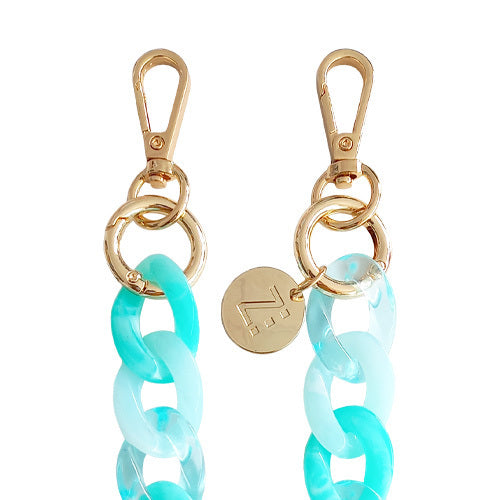 Les Chaînes d’Énergie – Bijoux & Téléphones | Collection PACIFIC PALISADES – Chaînes-bijoux élégantes en acrylique et acier doré