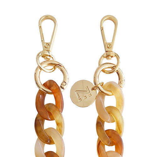 Les Chaînes d’Énergie – Bijoux & Téléphones | Collection PACIFIC PALISADES – Chaînes-bijoux élégantes en acrylique et acier doré