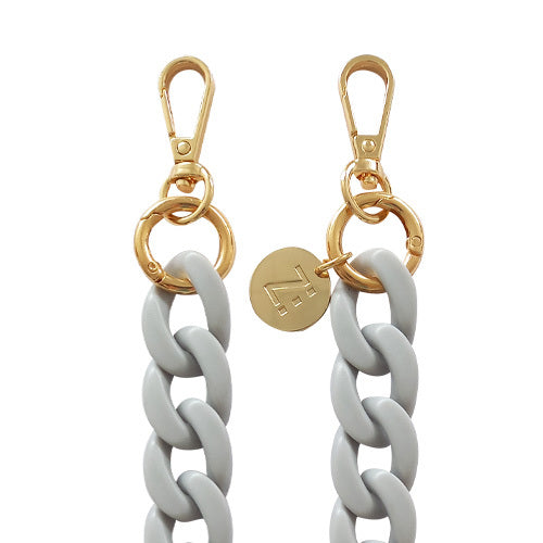 Chaînes-bijoux – Collection Fall & Mate : chaînes mates en acrylique et acier doré, disponibles en plusieurs couleurs automnales et longueurs.