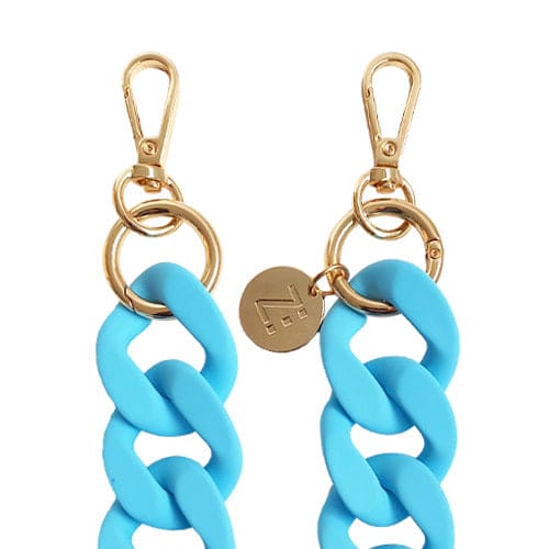 Les Chaînes d’Énergie – Bijoux & Téléphones | Collection INDIA SUMMER – Chaînes-bijoux élégantes en acrylique et acier doré