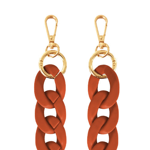 Chaînes-bijoux – Collection Fall & Mate : chaînes mates en acrylique et acier doré, disponibles en plusieurs couleurs automnales et longueurs.