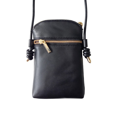 sac bandoulière élégant avec 2 compartiments, poche zippée et emplacement smartphone. Design raffiné, universel et pratique.